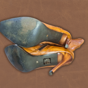 Bottom view of used soles on Europa Art size 5 leather knee-high boots