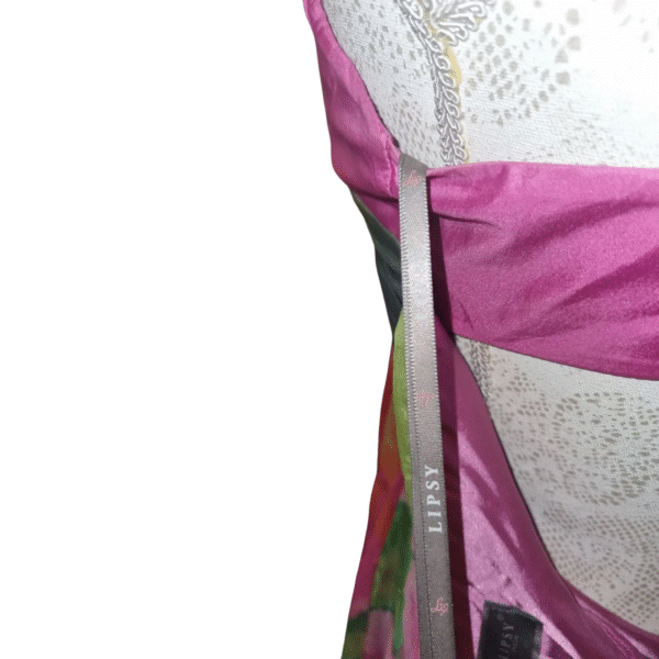 Lipsy side ribbon tag confirming authenticity on silk halter dress