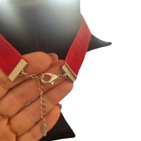 Adjustable silver clasp and red velvet ends of ladybug choker with charm extender