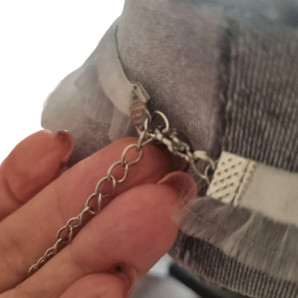 Silver clasp and extender on handmade white horse heart choker with white ribbon detail